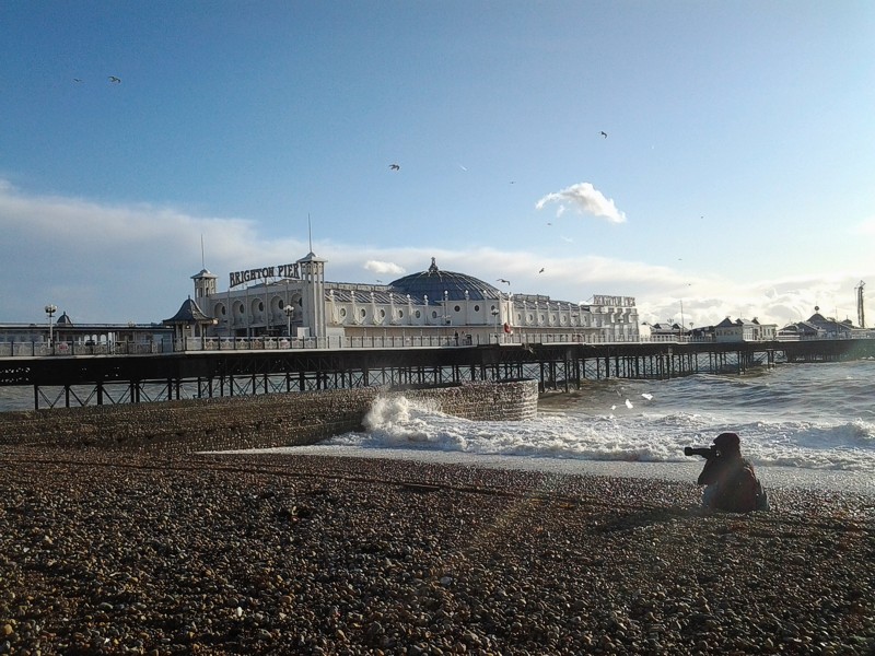 Brighton Palace Pier, with photographer